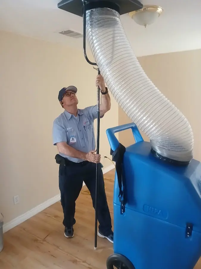 Furnace Tune-Up technician using HEPA equipment in Oregon